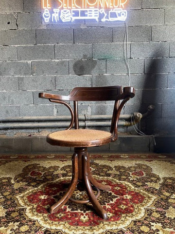 Fauteuil de barbier / coiffeur vintage Fischel en bois cintré et cannage de rotin - Début XXiéme