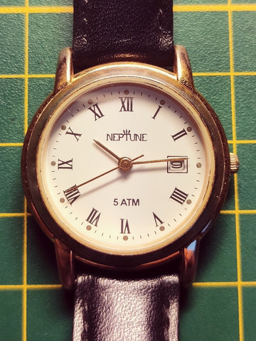 Montre quartz femme Neptune - Années 80 - Le Sélectionneur - Brocante en ligne