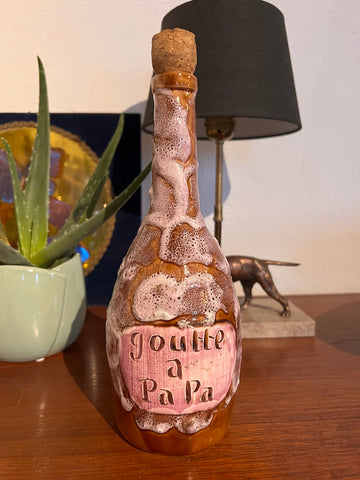 Bouteille vide vintage Goutte à Papa en céramique